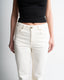 Detail off white stretch jeans golden button